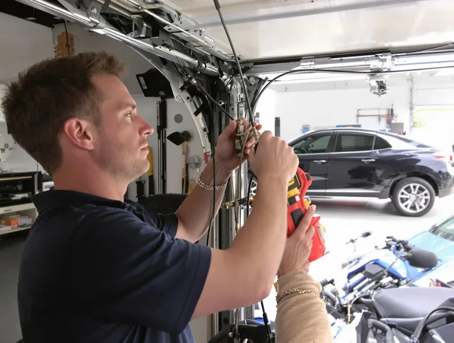 Black Forest Garage Door Repair safety certified technician performing cable replacement in Black Forest
