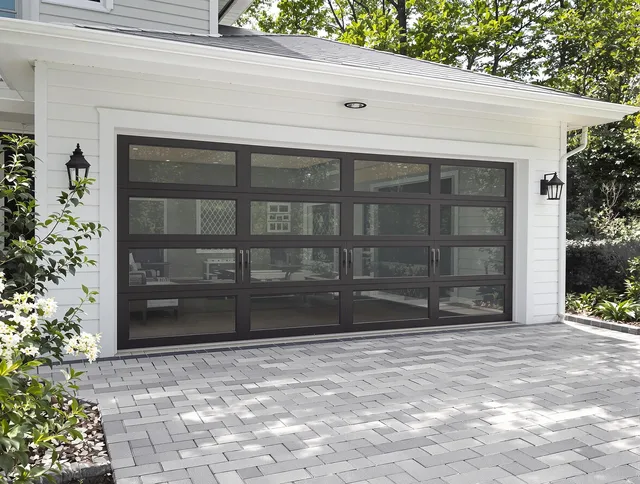 Black Forest Garage Door Repair design specialist presenting custom garage door options to Black Forest homeowner