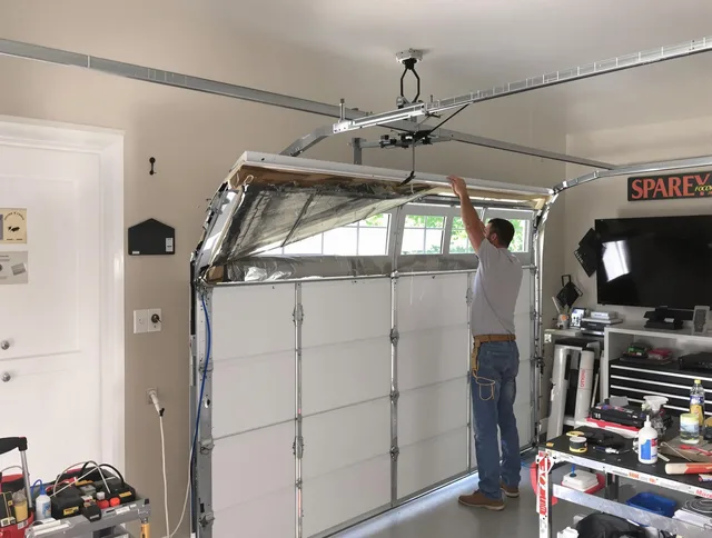 Garage door section replacement by Black Forest Garage Door Repair in Black Forest